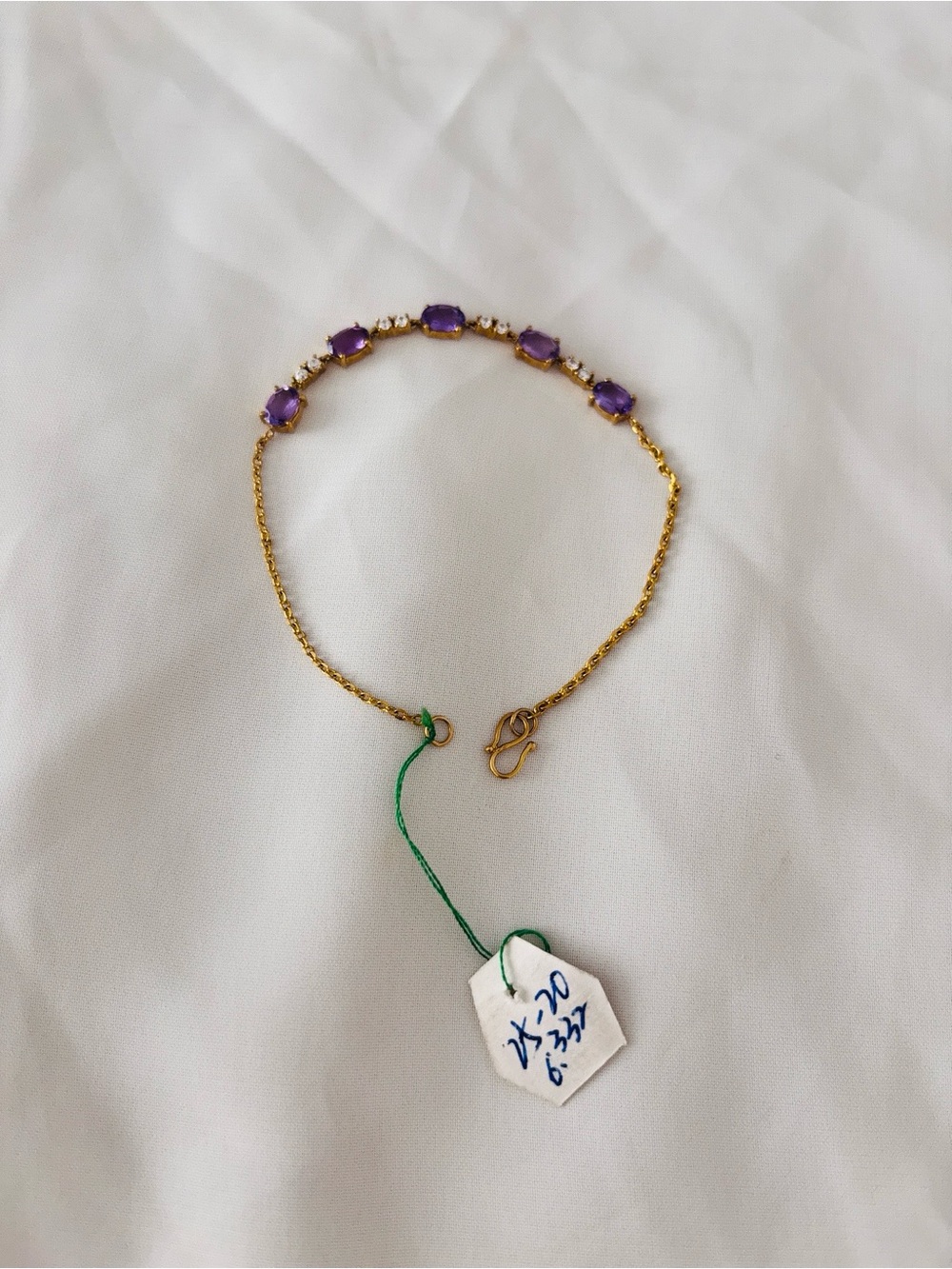 24k gold bracelet with crystal and purple gem stones